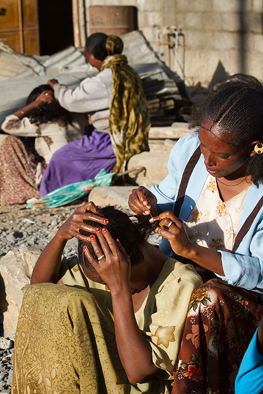 83   Hair braiding women. Ethiopia